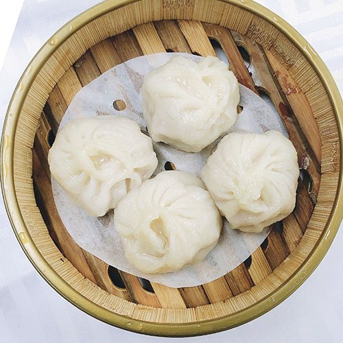 Xiao long bao — raviolis au porc et bouillon, plis fins